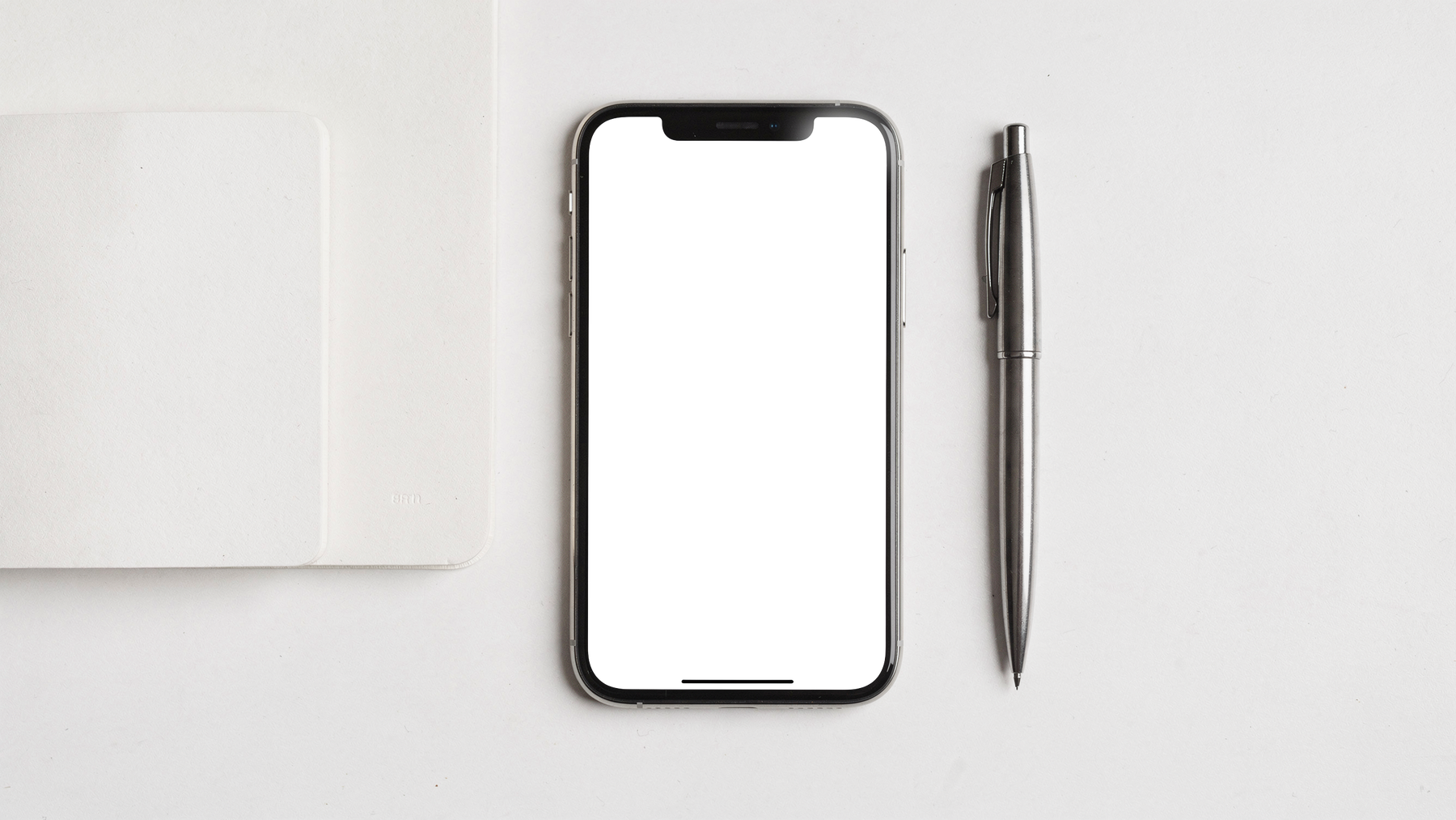 No P Desk White Notebook iPhone Mockup | Transparent Screen PNG Download | Commercial Licence | bulkmockup