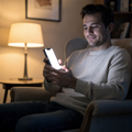 People Armchair Man Evening iPhone Mockup | High-Res PNG with Transparent Screen | Commercial Use | bulkmockup | MockupBulk