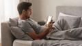 iPhone, People Bed Man Sit Up | bulkmockup PNG Template | Transparent Display | Commercial Use | MockupBulk