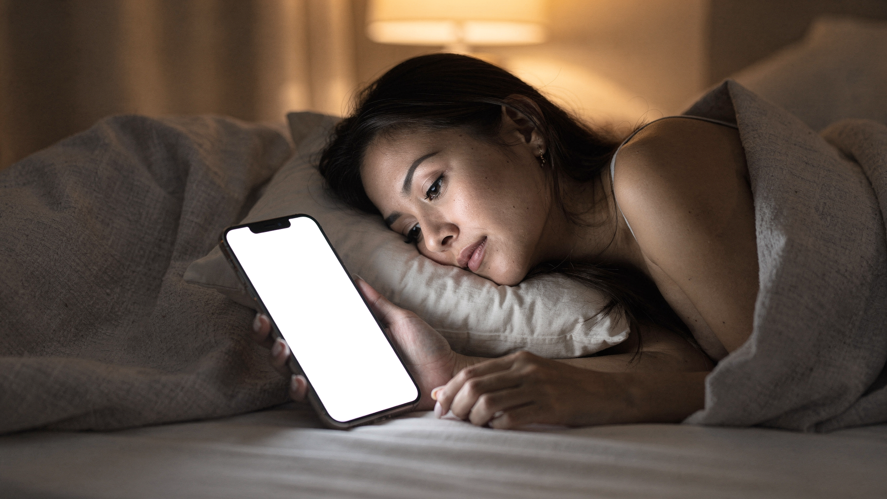 iPhone Mockup — People Bed Woman Side — bulkmockup Transparent Mockup | PNG Download | Commercial Use | MockupBulk