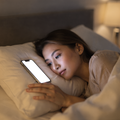 People Bed Woman Side iPhone Mockup | High-Resolution Transparent PNG | bulkmockup | Commercial Use | MockupBulk