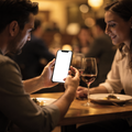 iPhone Mockup | People Restaurant Couple Table | High-Resolution Transparent PNG | bulkmockup | Commercial Use | MockupBulk