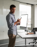 iPhone Mockup | People Standing Desk Man Stand | High-Resolution Transparent PNG | bulkmockup | Commercial Use | MockupBulk